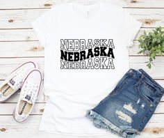 This Vintage Nebraska t-shirt is everything you’ve dreamed of and more. It feels soft and lightweight, with the right amount of stretch. It’s comfortable and flattering for all. • 100% combed and ring-spun cotton (Heather colors contain polyester) • Fabric weight: 4.2 oz./yd.² (142 g/m²) • Pre-shrunk fabric • Side-seamed construction • Shoulder-to-shoulder taping • Blank product sourced from Nicaragua, Mexico, Honduras, or the US Nebraska Volleyball, Campus Life, Casual Party Dresses, Sports Tee, Elegant Fall