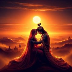 a man and woman sitting on top of a hill under a sunset