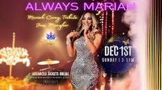 a woman in a silver dress standing next to a sign that says always mariah