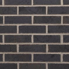 a black brick wall is shown with no mortars or mortars on the side