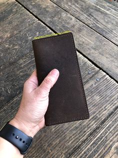 Looking for a new wallet that has that 'broken-in' feel without waiting weeks to get there? Then our handmade oil tanned roper style leather wallets are exactly what you are looking for. Oil-tanned leather is a little confusing, as oil tanned leather isn't tanned by an oil per se, but rather impregnated with certain oils as a part of the tanning and dyeing process. Oil tanned leather slightly changes color as it is used and develops a beautiful patina with years of use. Our oil tanned leather wa Rustic Brown Leather Wallets, Rugged Brown Wallet For Everyday Use, Rustic Brown Bifold Wallet, Leather Hand Tooled Trifold Wallet For Everyday Use, Hand Tooled Leather Trifold Wallet For Everyday Use, Leather Trifold Wallet Hand Tooled For Everyday Use, Western Style Brown Leather Wallet, Tanning Oil, Handmade Oil