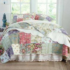 the comforter is made up with many different colors and patterns