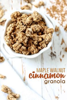 maple walnut cinnamon granola in a white bowl on top of a wooden table with text overlay