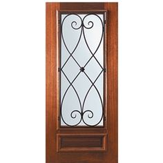 a wooden door with wrought iron design on the front and side glass paneled in