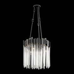 a chandelier with glass tubes hanging from it's center, on a black background