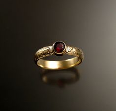 "This pretty ring has a Victorian antique look with a 5mm round Ruby red Pyrope \"anthill\" Garnet. These screaming red Garnets are brought to the surface by ants and collected by Native Americans in Arizona. This are about as large as they ever get (about .50ct) Set in 14k yellow Gold The band is 4mm wide and 1.5mm thick. Specify your size in a \"note to seller\" at check out." Antique Ruby Ring Vintage, Victorian Rings Vintage, Vintage Ruby Ring, Antique Ruby Ring, Garnet Wedding Rings, Garnet Ring Vintage, Ruby Ring Vintage, Garnet Wedding, Hammered Gold Ring