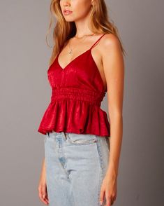 This flirty stain top features elasticized empire waist and ruffle trim. Wear this with a mini skirt and your favorite pair of heels for date night! Imported S M L BUST (OPEN BACK) 24" 26" 28" WAIST 26" 28" 30" LENGTH 18" 18" 18" Satin Top, Ruffle Trim, Empire Waist, Cotton Candy, Open Back, Date Night, Mini Skirt, Camisole Top, Mini Skirts