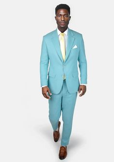 The vibrant linen cotton blend of the Astor Capri Blue Linen Suit will have you embracing the summer heat in comfort and confidence. Custom made and a guaranteed way to upgrading your wardrobe with a stylish, statement piece. Tailored Casual Summer Suits, Slim Fit Cotton Suit For Spring, Casual Linen Suits For Summer, Summer Cotton Suit For Business Casual, Spring Slim Fit Cotton Suits, Casual Linen Summer Suits, Tailored Blue Cotton Suit, Tailored Blue Summer Suits, Blue Cotton Notch Lapel Suit