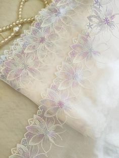 2 Yards Lace Trim Exquisite Light Purple Flowers Embroidered Tulle Lace 6.29 Inches Wide High Quality Width: 6.29"(16cm) This listing is for 2 yards. The longest piece is around 14 yards. If you order more, I will try to send you uncut piece. All the lace are perfect for lingerie, bra, dresses, dolls, bridal veil, altered art, couture, costume, jewelry design, pillowcase, home decor and other projects you could imagine.  Limited stock and no restocking. If you like it, order it now. For more quantity, please feel free to convo me for custom listing. Light Purple Dress, Asian Style Dress, Light Purple Flowers, Flowers Embroidered, Saree Designs Party Wear, Embroidered Tulle, Fabulous Fabrics, Tulle Lace