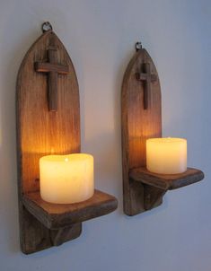 two wooden wall sconces with lit candles on them for $ 26 69 each