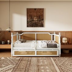 a white bed sitting on top of a wooden floor