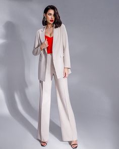 Blazer length 30 1/3 inches or 77 cm Sleeve length is 24,6 inches or 62,5 cm Pants length 47,2 in or 120 cm Inseam 34,6 inches or 88 cm 2-piece womens blazer trouser suit for office, business meetings, formal events and special occasions DETAILS -  straight long pants -  high rise -  blazer is buttoned -  blazer is characterized by uneven bottom: back is longer than the front part -  lined MATERIAL Premium quality suiting fabric, which consists of viscose mostly and a bit of polyester and elastane SIZES The models in photos are wearing a size S (4) Available in 4 sizes: 2 US numeric  BUST 32-34 inches or 82-86 cm WAIST 23-24.8 inches or 59-63 cm HIPS 33-35 inches or 86-90 cm 4 US numeric  BUST 34-35 inches or 86-90 cm WAIST 25-26 inches or 63-67 cm HIPS 35-37 inches or 90-94 cm 6 US numeri Solid Color Wide Leg Workwear Sets, Formal Trouser Sets With Pockets, Elegant Wide-leg Sets With Pockets, Elegant Sets With Solid Color Trousers, Workwear Sets With Pockets, Elegant Full-length Pantsuit With Pockets, Beige Workwear Sets With Straight Pants, Beige Formal Pantsuit With Pockets, Beige Straight Pants Sets For Workwear