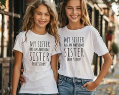 Celebrate your bond with our "My Sister Has an Awesome Sister True Story!" T-Shirt. This funny and heartfelt T-Shirt is perfect for twins and the world's best sisters and makes a fantastic gift. Designed with love and humor, it is a wonderful way to show your appreciation for each other. Ideal for birthdays, holidays or just because! * 100% combed and ring-spun cotton (Heather colors contain polyester) * Fabric weight: 4.2 oz./yd.² (142 g/m²) * Pre-shrunk fabric * Side-seamed construction * Shou Funny Personalized Short Sleeve T-shirt, Personalized Matching Crew Neck T-shirt, Personalized Matching T-shirts As Gifts, Cute Custom Text T-shirt For Gift, Cute T-shirt With Custom Text For Gift, Funny Gift Idea, Sisters Funny, Best Sister, Funny Shirt