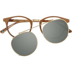 These round acetate glasses come with a metal clip-on polarized sunshade for instant sunnies. The medium-sized eyeglasses is available in the following options: caramel brown with a subtle woodgrain pattern and gold clip-on featuring dark gray tinted lenses with silver mirror finish tortoiseshell with gold clip-on featuring dark amber tinted lenses and blue/brown striped pattern with blue clip-on featuring dark gray tinted lenses. | Zenni Round Prescription Eyeglasses W/ Snap-On Sunlens Brown Tortoise Shell Plastic Sunshade Design, Artsy Vibe, Woodgrain Pattern, Round Eyeglasses Frames, Acetate Glasses, Square Face Shape, Zenni Optical, Square Face, Round Eyeglasses