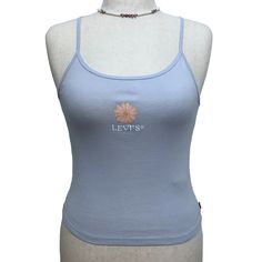 Nwt. Baby Blue Tank Top For Women Various Sizes. Flower And Brand Graphic Logo Front, Knit Construction. Chocker Is Not Included. Pictures Are Part Of Description. Pictures Shown Are Size M. Measurements Are Taken While Laid Flat And Approximate Pit (Unstretched), Length Respectively Xs = 12", 19" M = 14", 20.5" Bundle To Save Or Reasonable Offers Only Pls. Blue Y2k Tank Top For Spring, Y2k Blue Tank Top For Spring, Y2k Style Blue Tank Top For Spring, Light Blue Fitted Casual Tank Top, Casual Fitted Light Blue Tank Top, Fitted Light Blue Casual Tank Top, Casual Light Blue Fitted Tank Top, Light Blue Fitted Cotton Tank Top, Light Blue Fitted Tank Top For Spring