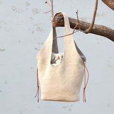 Minimalist Style Cotton Linen Korean Bucket Bag with Jacquard Lining in Beige Orange - Morimiss.com Beige Hobo Bag With Pockets For On-the-go, Everyday Beige Shoulder Bag With Cell Phone Pocket, Versatile Beige Hobo Bag With Phone Pocket, Beige Canvas Pouch Bag With Mobile Phone Holder, Beige Canvas Pouch With Mobile Phone Bag, Everyday Beige Bucket Bag With Mobile Phone Holder, Everyday Beige Bag With Cell Phone Pocket, Beige Handheld Phone Bag For Everyday, Everyday Hobo Tote Bag With Mobile Phone Bag