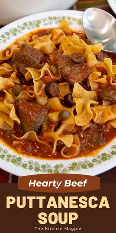 hearty beef potanesca soup in a white bowl on a green and white plate