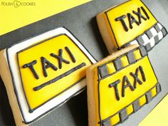 decorated cookies in the shape of taxi signs