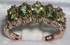 "*This ring is made from 585 14K (14ct 14Kt) Rose Gold with Genuine Natural Peridots. This is a beautiful Antique Style 14K Rose Gold ring set with five 6x4mm (0.24\"x0.16\" inches) vibrant natural Peridot gemstones in a stunning solid 14K Yellow Gold setting with carving on the shoulders.  This ring is handcrafted from Solid English 14K Gold and tested and fully Hallmarked by the London Assay Office.   All the Gemstones are Genuine Natural Gemstones, hand-selected for color and clarity. If you have any specific gemstone requirements then please do convo me. PLEASE MAKE SURE YOU STATE THE FINGER SIZE YOU REQUIRE WITH YOUR PAYMENT AND ALSO INCLUDE YOUR TELEPHONE NUMBER FOR DELIVERY COURRIER. < CUSTOMIZATION > This ring can be customized to your requirements  - 9K, 14K, or 18K Yellow, Rose o Peridot Engagement Rings, Rose Gold Ring Set, Estilo Ivy, Ring Rosegold, 14k Rose Gold Ring, Eternity Band Ring, Gold Ring Sets, Yellow Gold Setting, Peridot Gemstone