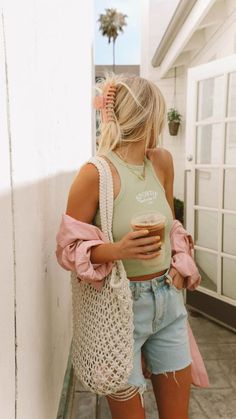 summer inspo, cute summer outfits, trendy summer outfit, morning coffee run, summer aesthetic, beach aesthetic, beachy outfit, cute beach bag, claw clip, beach hairstyle Trendy 70s Inspired Outfits, Jean Shorts And Blouse Outfit, Neutral Fashion Aesthetic Summer, Vacation Outfits Germany, Cali Fashion Summer, Tropical Vacation Dresses Summer, Brunch Outfit Beach, Beach Vacation Casual Outfits, Summer Receptionist Outfits