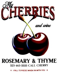 an advertisement for cherries and olives, with two cherries on the front