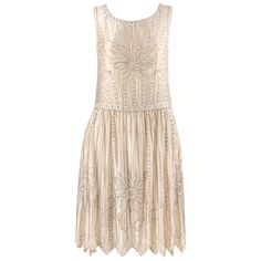 1920s Embellished Flapper Cocktail Dress, 1920s Embellished Cocktail Flapper Dress, Elegant Beaded Flapper Dress, Elegant Embellished Flapper Dress For Wedding, 1920s Embellished Flapper Dress For Wedding, Elegant Beaded Dresses For Vintage Events, Gatsby Style Embellished Dress For Vintage Events, Elegant Gold Flapper Dress For Formal Occasions, Elegant Gold Formal Flapper Dress