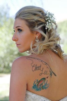 a woman with a tattoo on her back