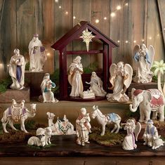 a nativity scene with figurines and lights