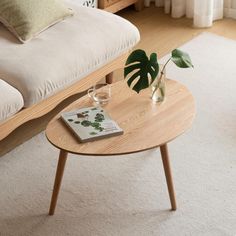 a wooden coffee table with a magazine on it