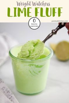 a person scooping lime ice cream into a small glass cup with the text, weight watchers lime fluff