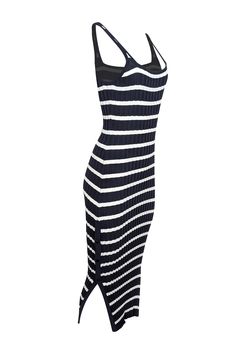 Make a stylish statement in this playful Solid & Striped ribbed dress! The navy blue and white stripes make it perfect for any weekend adventure, while the soft ribbed fabric gives it a comfortable fit. Style it with espadrille sandals and sunnies for the perfect laid-back look. Weekends just got a whole lot more fashionable! Size S 65% Viscose, 35% Nylon Unlined Pullover Side button detail Sleeveless Bust 28" Waist 20" Shoulder to hem 52" Ribbed Dress, Solid & Striped, Espadrille Sandals, The Navy, Fit Style, Ribbed Fabric, Button Detail, Navy White, Navy And White