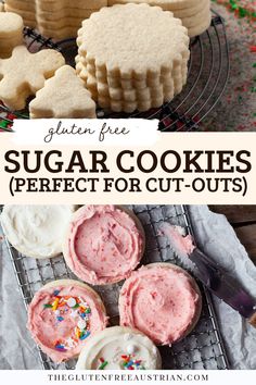 sugar cookies with pink frosting and sprinkles on a cooling rack next to the