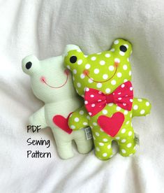 two stuffed animals sitting next to each other on a white sheet with the words pdp sewing pattern