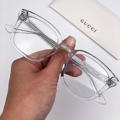 Gucci Gg0184o 012 Eyeglasses Crystal Clear Silver Square Unisex Brand - Gucci Model - Gg0184o Color Code - 012 Frame Color - Crystal Clear Silver Frame Shape - Square Frame Style - Full Rim Frame Material - Acetate Lens Material - Demo / Customisable Size - 50/21/145 Gender - Unisex Year - 2019 100% Uv Protection Authentic! Full Retail Package With All Accessories. Made In Italy Designer White Glass Sunglasses, Gucci Designer Clear Sunglasses, Designer Gucci Clear Sunglasses, Designer Clear Glass Sunglasses, Luxury Clear Gucci Sunglasses, Gucci Clear Square Frame Sunglasses, Gucci Clear Glass Sunglasses, Luxury White Gucci Sunglasses, Elegant White Gucci Sunglasses