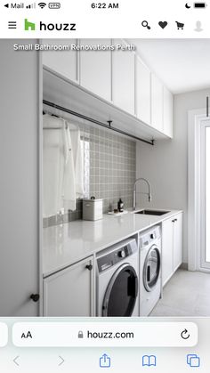 an appliance is displayed on the phone in front of a washer and dryer