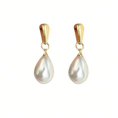 Description: Indulge in the opulence of these Pearlescent Waterdrop Earrings. The pearlescent waterdrops evoke a sense of luxury and sophistication, while the intricate details add an artistic touch. These earrings are the perfect statement piece to elevate any outfit. Affordable Luxury Jewelry High-Quality Gold Plating Versatile for Daily Wear Perfect Gift for Women Quiet Luxury and Individuality Combined Chic Silver Teardrop Pearl Earrings, Elegant White Drop Pearl Earrings, Pearl Drop Teardrop Dangle Earrings, Pearl Teardrop Dangle Earrings With Pearl Drop, Teardrop Pearl Earrings For Pierced Ears, Elegant Pearl Teardrop Earrings, Elegant Pearl White Teardrop Earrings With Pearl Charm, Elegant Teardrop Crown Pearl Drop Earrings, White Teardrop Earrings For Evening