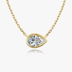 The Bezel Solitaire Necklace combines vintage-inspired detail and modern appeal together for a look that’s timelessly elegant. Solitaire Necklace, Solitaire Necklaces, Pear Cut, Necklace Designs, Diamond Shapes, Solid Gold, Diamond Necklace, Pear, Vintage Inspired