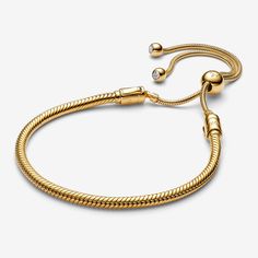 Our Pandora Moments Snake Chain Slider Bracelet is a sophisticated spin on the classic friendship bracelet. Crafted in 14k gold plating, it has two moveable end caps — both set with shimmering stones. An innovative sliding clasp makes it easy to adjust to your size. The perfect present for friends and loved ones, it can be styled by lifting either end cap and adding your favourite charms. - Pandora Snake Chain Slider Bracelet - No Other Material / 14k Gold-plated unique metal blend / Cubic Zirco Gold Pandora Bracelet, Charms Disney, Gold Pandora, Pandora Essence, Slider Bracelet, Bracelet Tennis, Charms Pandora, Snake Chain Bracelets, Chain Bracelets