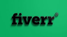 the word'fiverr'is cut out of black paper and placed on a green background