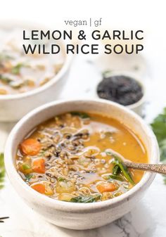 two bowls of lemon and garlic wild rice soup