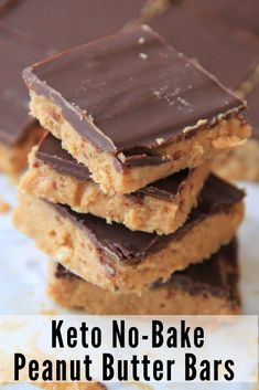 keto no - bake peanut butter bars stacked on top of each other