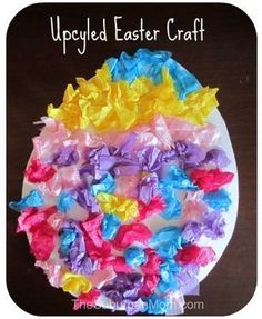 an easter egg made out of tissue paper and colored crepe paper with the words upcycled easter craft on it