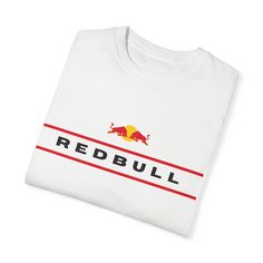 a red bull t - shirt is shown on a white surface with the word,'redbull '