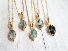 Beautiful and alluring genuine moss agate is hung from your choice of high quality gold fill chain. These stones have such a wonderful and natural beauty that inspires a connection to nature. Moss Agate is considered to be the stone of new beginnings and is all about attracting abundance and tapping into deep-set creativity. Such a beautiful and unique gemstone. It can be clear to milky white, with dendritic inclusions of manganese or iron that have grown into patterns similar to moss or lichen, Moss Agate Necklace, Dainty Gemstone Necklace, Attracting Abundance, Stone Pictures, Crystal Healing Stones, Handmade Jewelry Gift, Agate Necklace, Gold Stone, Boho Gifts