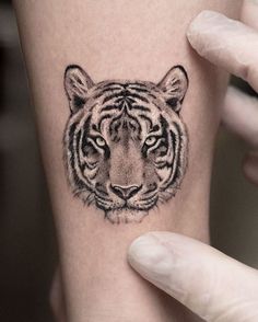 Tiger Tattoos: Placement, Tattoo Styles & Ideas Tattoos Placement, Placement Tattoo, Animal Tattoos For Men, Tiger Tattoos, Animals Tattoos, Face Tattoos For Women