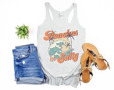 Retro Inspired Beaches Be Salty Women's Racerback Tank to is perfect for your beach vacation or just hanging poolside all summer long! Makes a great gift! Looking for additional outdoor apparel? Check these out: https://www.etsy.com/shop/TheGraphicPeach?ref=seller-platform-mcnav§ion_id=31675954 Our shop uses direct-to-garment printing to make our products. The design ink is sprayed on, then allowed to soak into the fibers of the garment. This process yields fine quality prints and a smooth finis Summer Vacation Racerback Tank Top, Racerback Tank Top For Summer Vacation, Beachy Tank Top For Poolside Summer, Beach Season Racerback Tops, Summer Racerback Tank Top For Vacation, Summer Tank Top For Poolside And Beach Season, Summer Racerback Tank Top For Beach Season, Racerback Tank Top For Beach Season Vacation, Racerback Tank Top For Beach Vacation