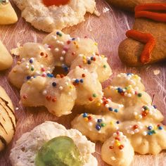 an assortment of cookies and pastries on a table