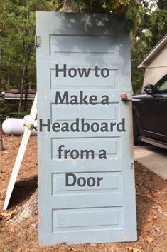 a sign that says how to make a headboard from a door on the side of a road