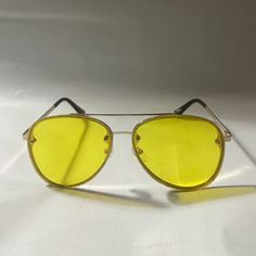 Yellow Aviator Sunglasses With Yellow Glitter Rim On Lenses. Brand New With Tag. Gold Aviator Sunglasses With Uv Protection For Parties, Gold Aviator Sunglasses With Glass Lenses For Beach, Gold Aviator Sunglasses With Glass For Beach, Gold Aviator Sunglasses For Party, Gold Casual Aviator Sunglasses For Party, Gold Glass Aviator Sunglasses For Beach, Casual Gold Aviator Sunglasses For Party, Yellow Glass Sunglasses For Party, Yellow Aviator Sunglasses