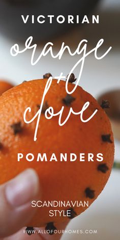 a hand holding an orange with the words victorian orange covore written on it